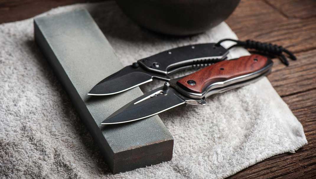 knives on sharpening stone
